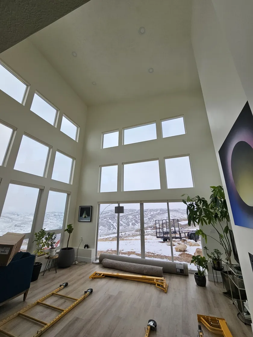 Vaulted great room with floor to ceiling windows built near Salt Lake City